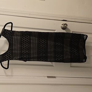 Women's black lace dress with open back, size large